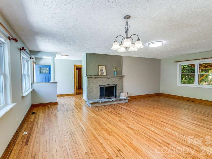 2629 Soco Road, Maggie Valley, NC 28751.  MLS# CAR4374834, YatesRealty ID 17029. Spacious living room with dedicated dining area