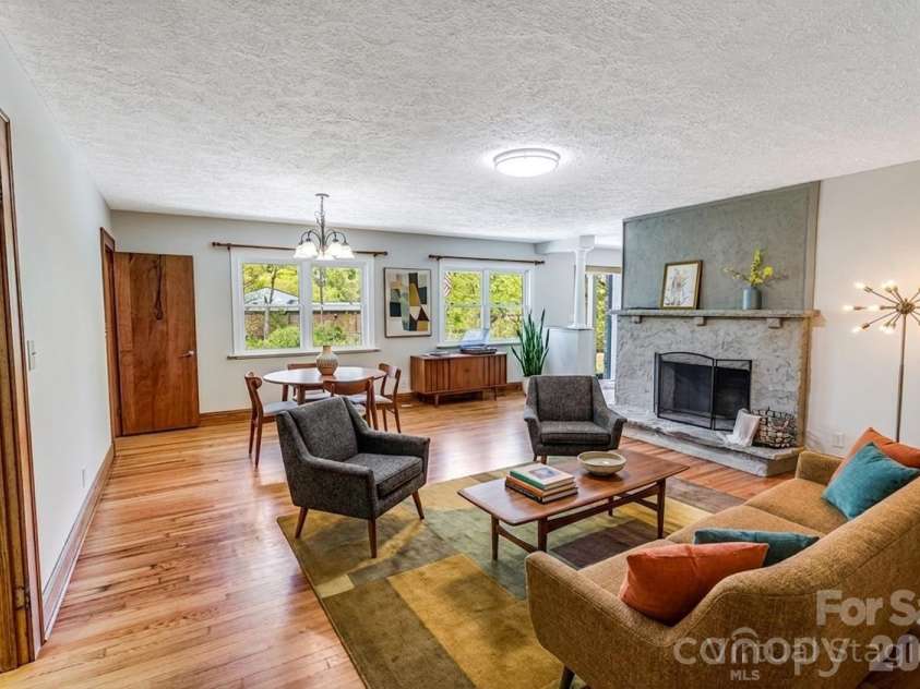 2629 Soco Road, Maggie Valley, NC 28751.  MLS# CAR4374834, YatesRealty ID 17029. Virtually staged living and dining room