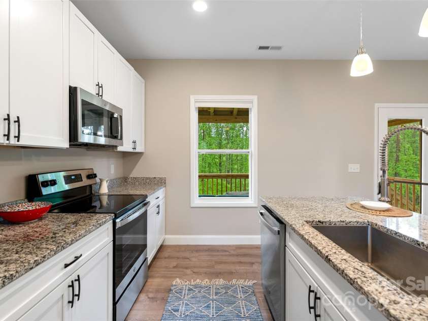 43 Clarks Chapel Extension, Weaverville, NC 28787.  MLS# CAR4258672, YatesRealty ID 17029. Ample Cabinet and Counter Space