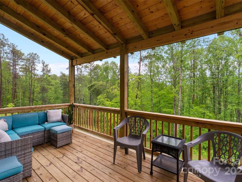 43 Clarks Chapel Extension, Weaverville, NC 28787.  MLS# CAR4258672, YatesRealty ID 17029. Covered Back Deck for Gatherings