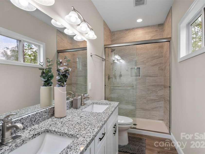 43 Clarks Chapel Extension, Weaverville, NC 28787.  MLS# CAR4258672, YatesRealty ID 17029. Granite-Topped Double Vanity and Tiled, Walk-In Shower