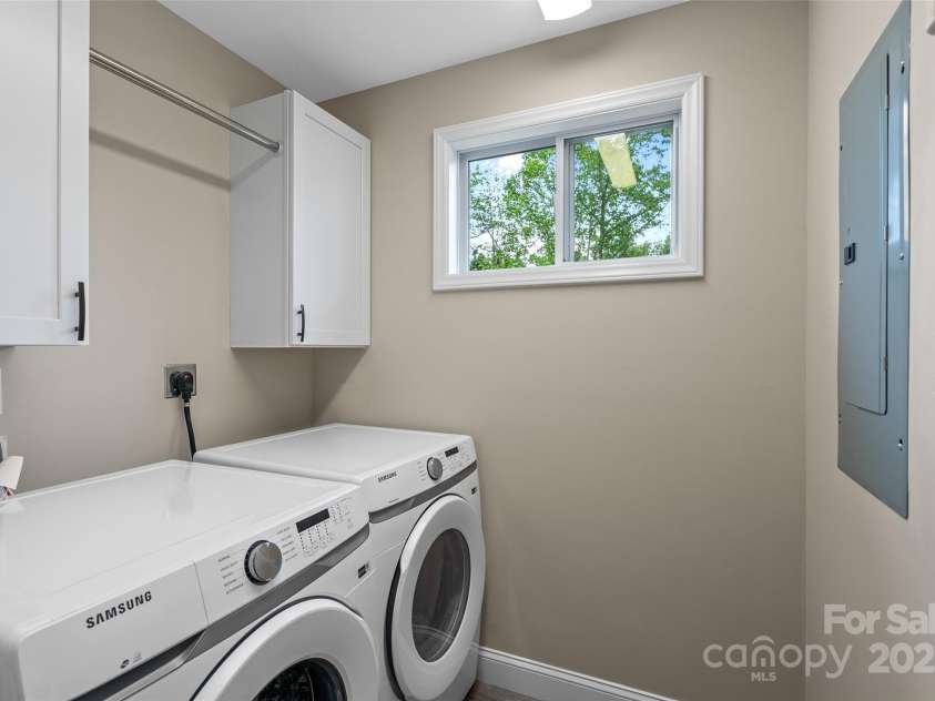 43 Clarks Chapel Extension, Weaverville, NC 28787.  MLS# CAR4258672, YatesRealty ID 17029. Laundry Room with Built-In Storage