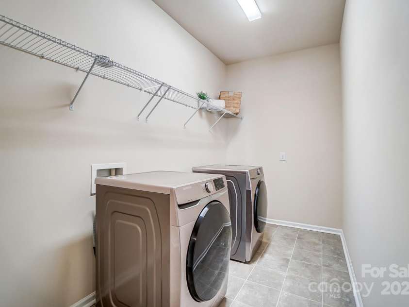 11144 Limehurst Place, Charlotte, NC 28278.  MLS# CAR4240129, YatesRealty ID 17030. Laundry upstairs
