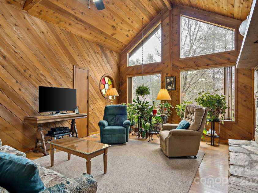 9675 Montford Cove Road, Marion, NC 28752.  MLS# CAR4206983, YatesRealty ID 17032. A great room to bring the outdoors in!