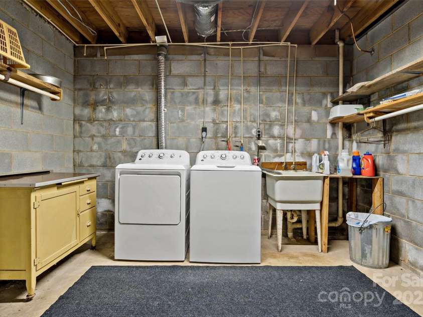 9675 Montford Cove Road, Marion, NC 28752.  MLS# CAR4206983, YatesRealty ID 17032. Basement with laundry.