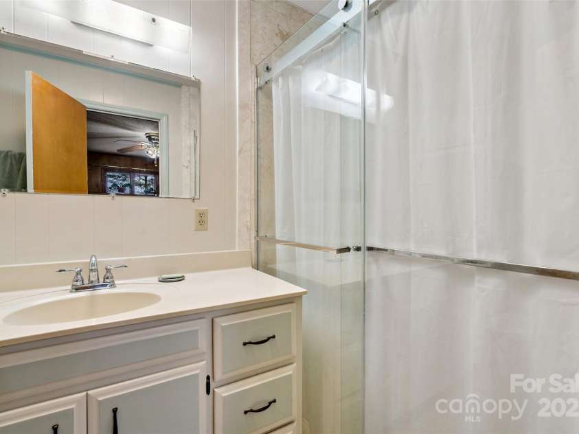 9675 Montford Cove Road, Marion, NC 28752.  MLS# CAR4206983, YatesRealty ID 17032. Updated primary bathroom.