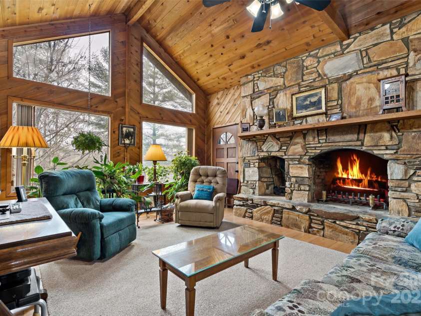 9675 Montford Cove Road, Marion, NC 28752.  MLS# CAR4206983, YatesRealty ID 17032. Warm up by the fire.