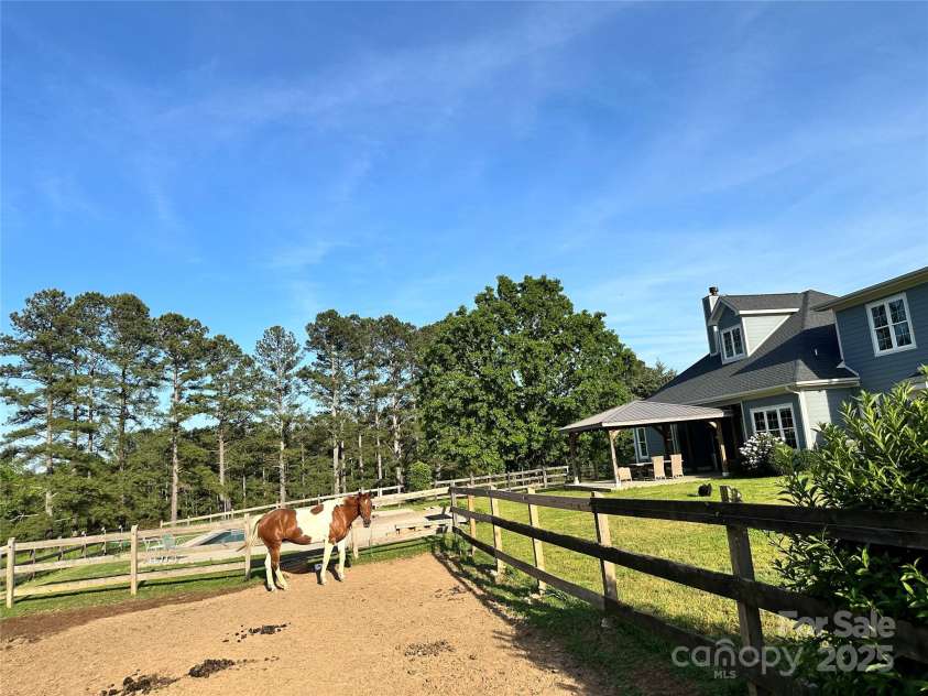 68 Stone Cottage Lane, Landrum, SC 29356.  MLS# CAR4251994, YatesRealty ID 17042. 12 acres fenced with paddocks, run ins, storage