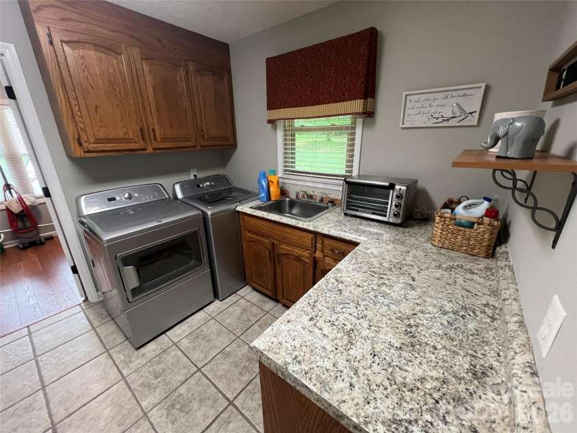 239 Hickory Lane Drive, Mount Holly, NC 28120.  MLS# CAR4374961, YatesRealty ID 17044. 