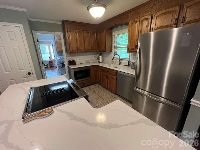 239 Hickory Lane Drive, Mount Holly, NC 28120.  MLS# CAR4374961, YatesRealty ID 17044. 