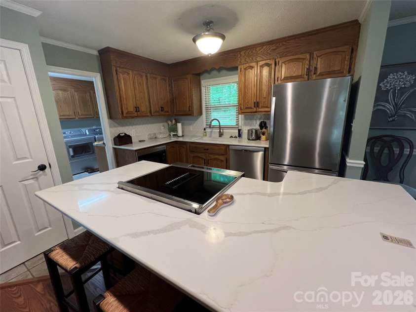 239 Hickory Lane Drive, Mount Holly, NC 28120.  MLS# CAR4374961, YatesRealty ID 17044. 