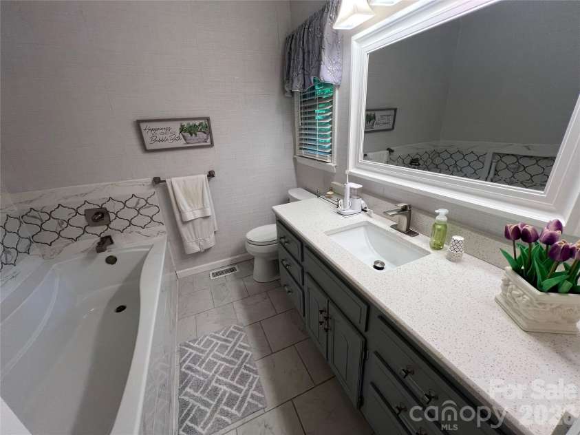 239 Hickory Lane Drive, Mount Holly, NC 28120.  MLS# CAR4374961, YatesRealty ID 17044. 