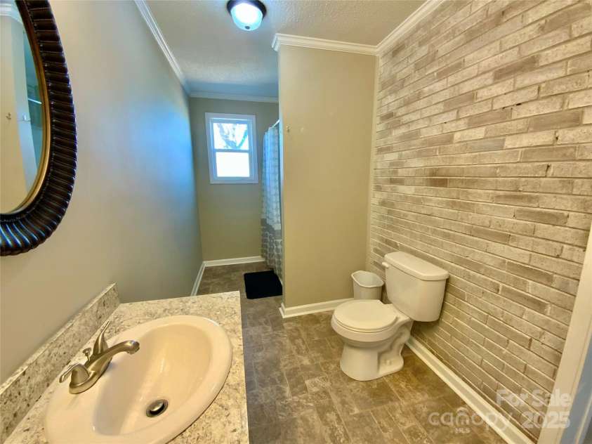 3807 Woodlawn Street, Sharon, SC 29742.  MLS# CAR4233211, YatesRealty ID 17047. Primary bathroom