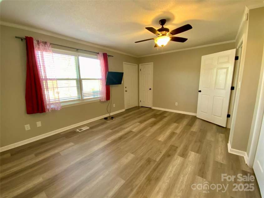 3807 Woodlawn Street, Sharon, SC 29742.  MLS# CAR4233211, YatesRealty ID 17047. Primary bedroom with private exterior door to front porch