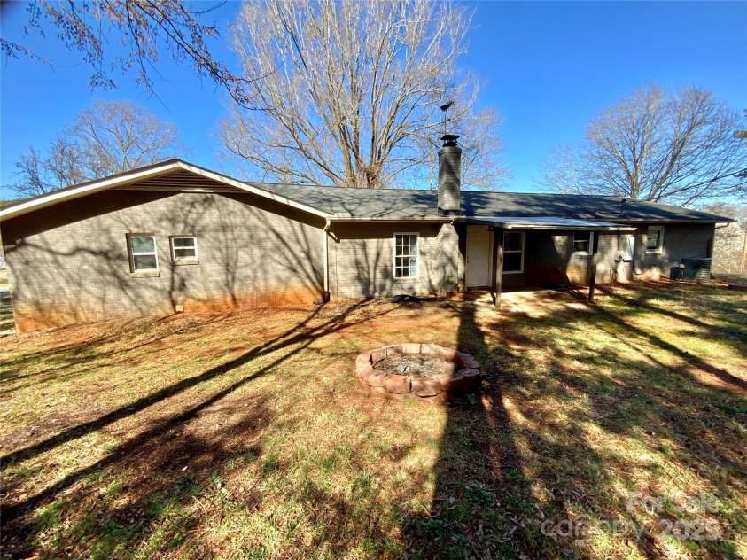 3807 Woodlawn Street, Sharon, SC 29742.  MLS# CAR4233211, YatesRealty ID 17047. There are two fire pits on this property