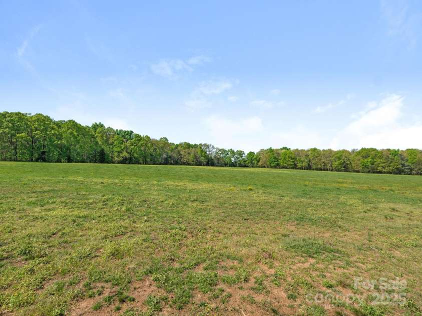 16160 Hopewell Church Road, Midland, NC 28107.  MLS# CAR4228175, YatesRealty ID 17048. Rear Pasture