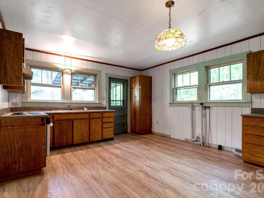 257 Pine Street, Black Mountain, NC 28711.  MLS# CAR4374948, YatesRealty ID 17050. Spacious kitchen with laundry hook ups