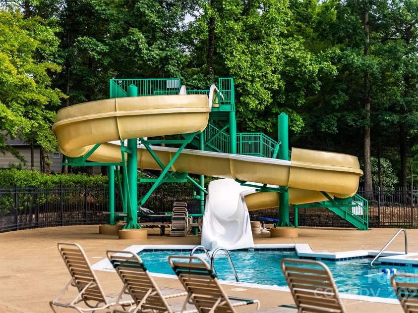 9410 Greenbank Court, Charlotte, NC 28214.  MLS# CAR4262994, YatesRealty ID 17051. Riverbend Swim Club Slide