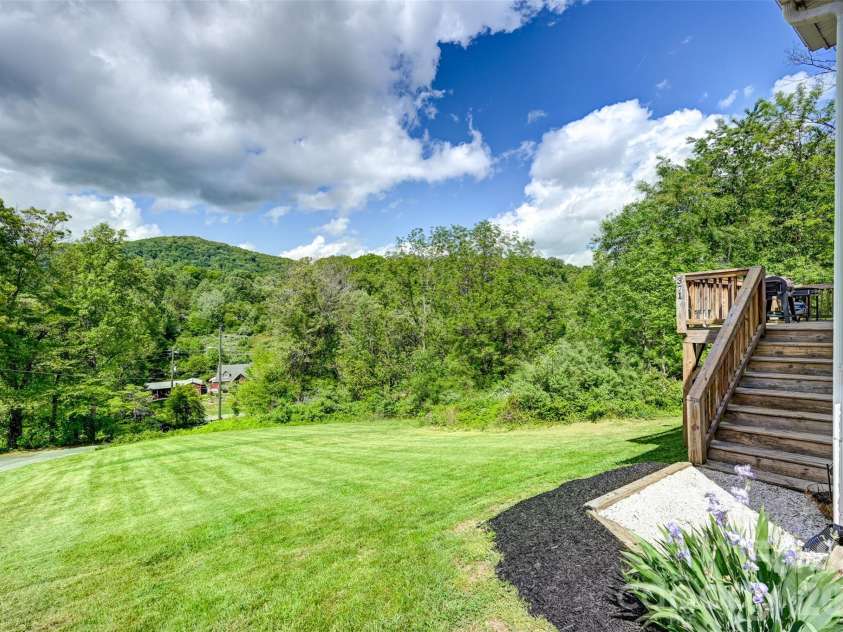 371 Starnes Cove Road, Candler, NC 28715.  MLS# CAR4376592, YatesRealty ID 17052. 