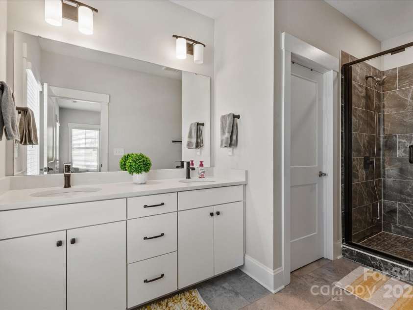 1036 Riverwalk Parkway, Rock Hill, SC 29730.  MLS# CAR4263782, YatesRealty ID 17055. Dual vanities and spacious shower