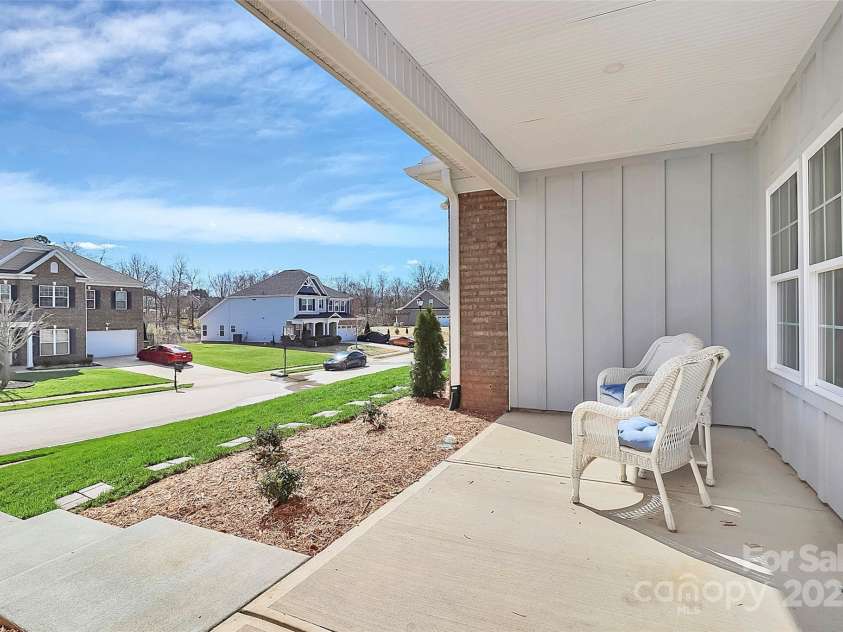 609 Rosemore Place, Rock Hill, SC 29732.  MLS# CAR4228092, YatesRealty ID 17056. Rocking Chair Front Porch