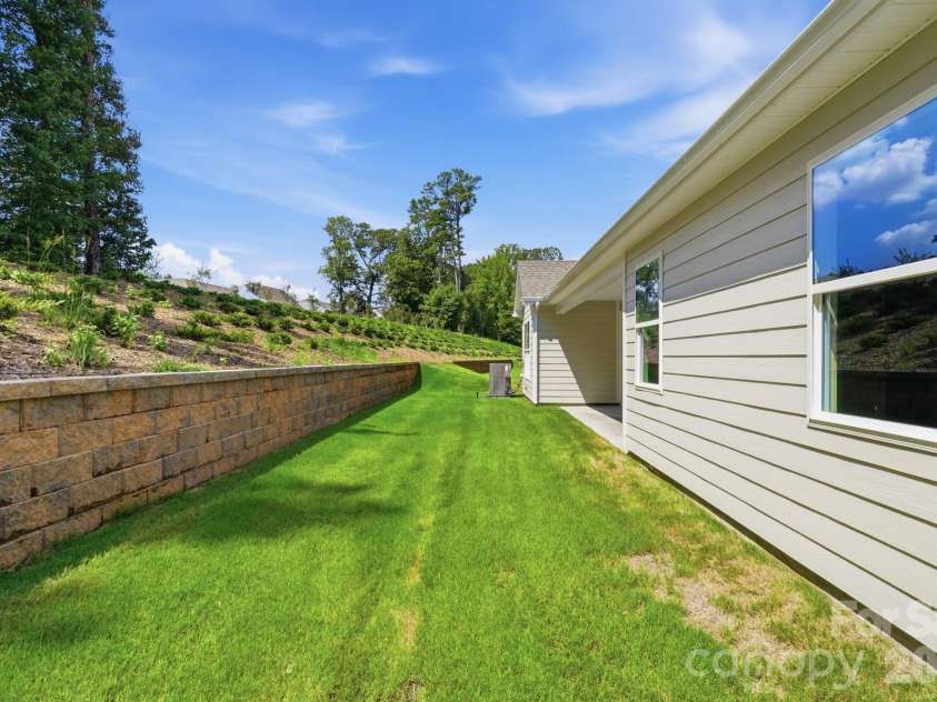 5064 McLaughlin Loop, Waxhaw, NC 28173.  MLS# CAR4375308, YatesRealty ID 17061. Backyard