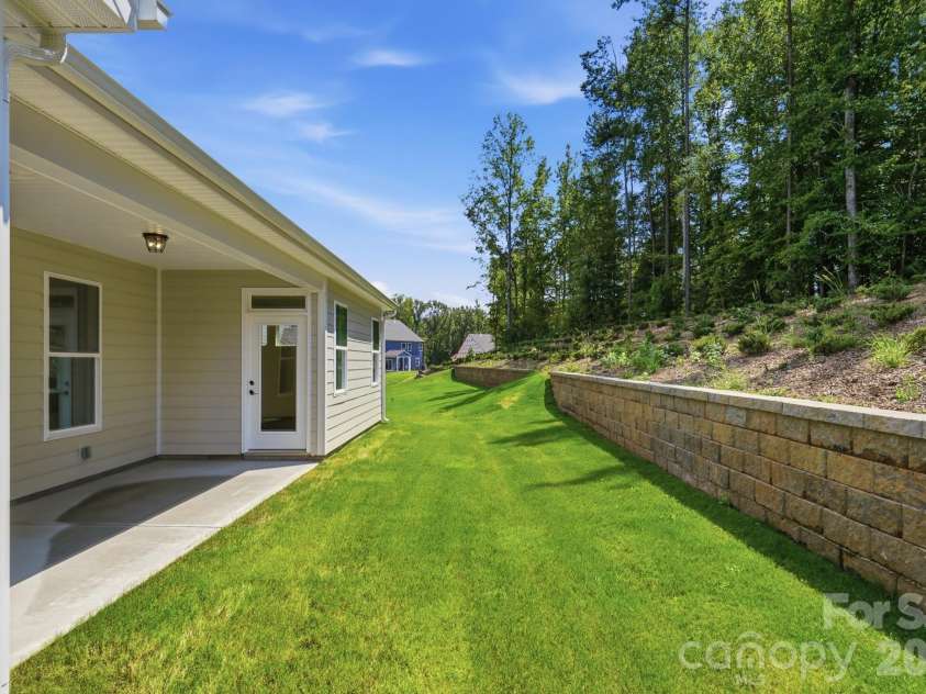 5064 McLaughlin Loop, Waxhaw, NC 28173.  MLS# CAR4375308, YatesRealty ID 17061. Backyard