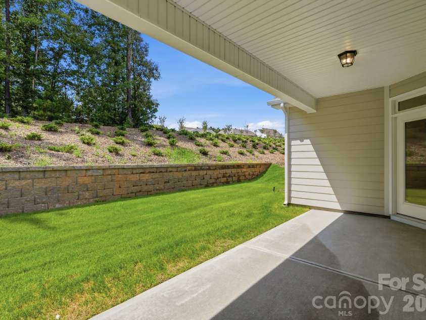 5064 McLaughlin Loop, Waxhaw, NC 28173.  MLS# CAR4375308, YatesRealty ID 17061. Covered porch