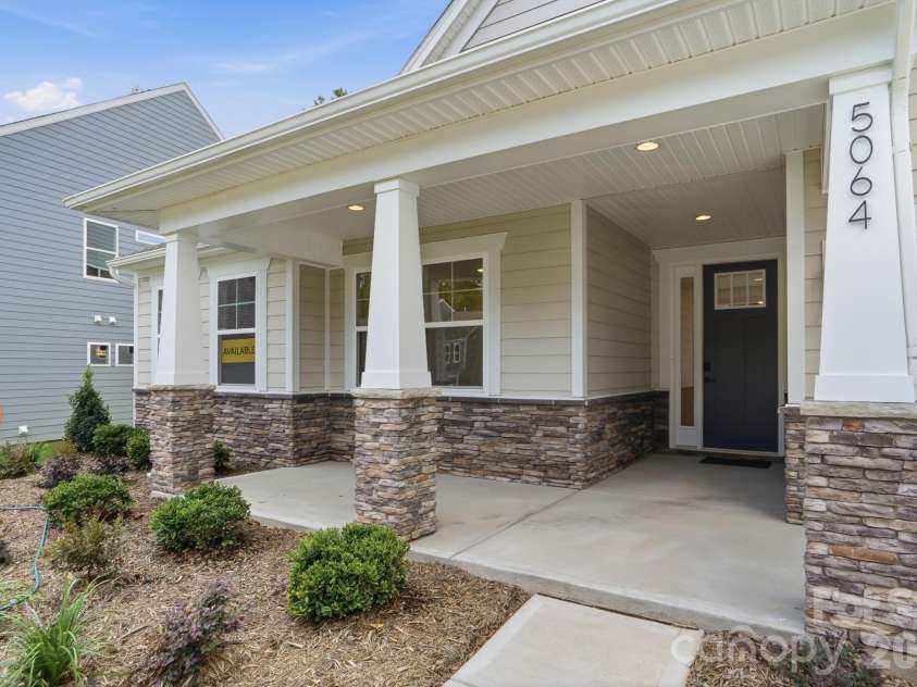 5064 McLaughlin Loop, Waxhaw, NC 28173.  MLS# CAR4375308, YatesRealty ID 17061. Front porch