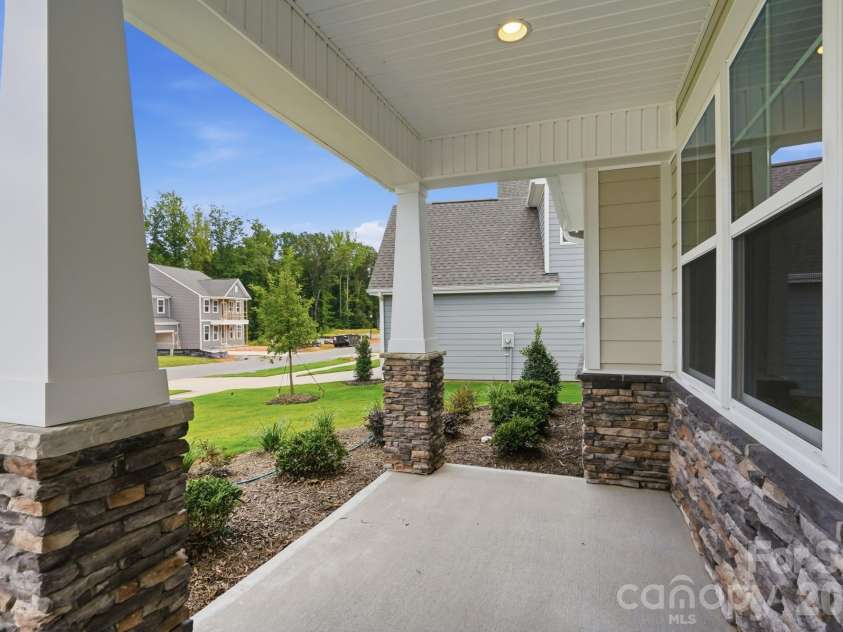 5064 McLaughlin Loop, Waxhaw, NC 28173.  MLS# CAR4375308, YatesRealty ID 17061. Front porch