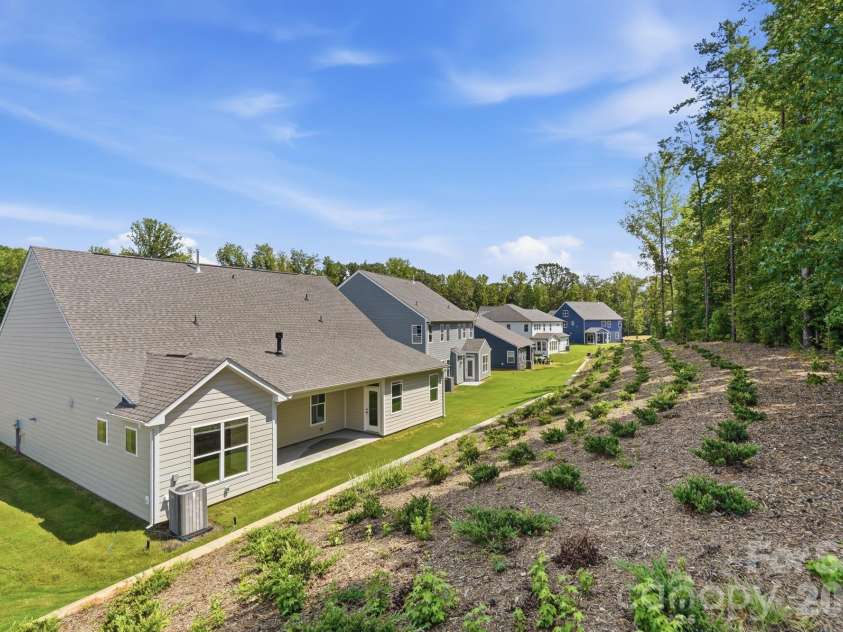 5064 McLaughlin Loop, Waxhaw, NC 28173.  MLS# CAR4375308, YatesRealty ID 17061. Rear of home