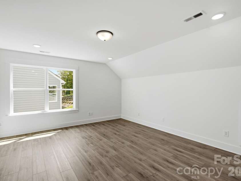 5064 McLaughlin Loop, Waxhaw, NC 28173.  MLS# CAR4375308, YatesRealty ID 17061. Upper level loft
