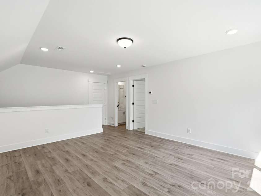 5064 McLaughlin Loop, Waxhaw, NC 28173.  MLS# CAR4375308, YatesRealty ID 17061. Upper level loft