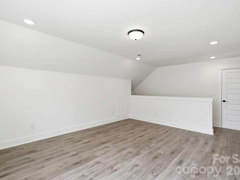 5064 McLaughlin Loop, Waxhaw, NC 28173.  MLS# CAR4375308, YatesRealty ID 17061. Upper level loft