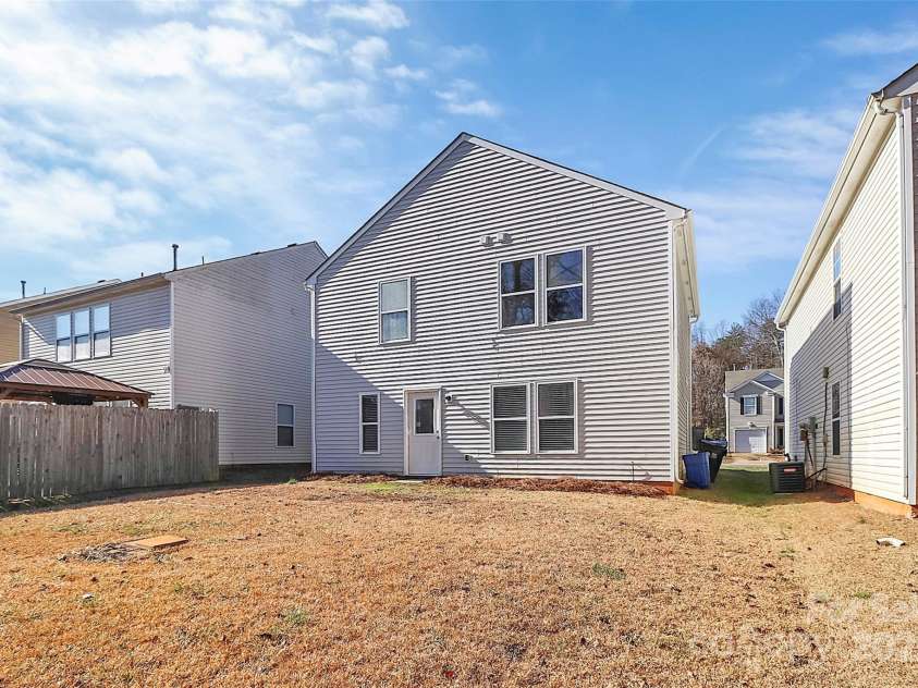 7214 Fox Point Drive, Charlotte, NC 28269.  MLS# CAR4266650, YatesRealty ID 17062. Backyard is nice and flat, easy for fencing/entertaining!