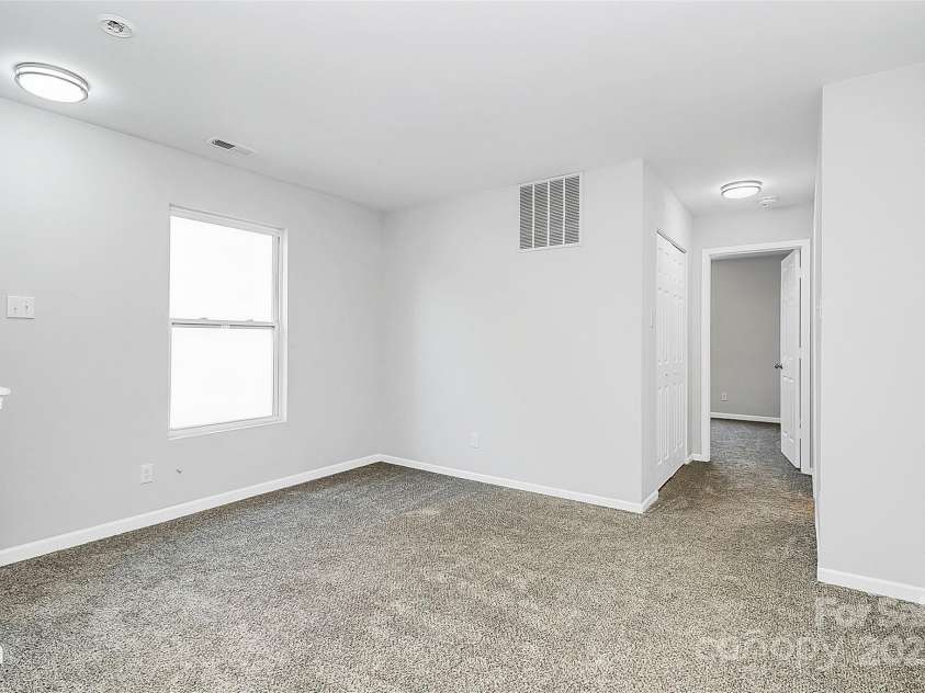 7214 Fox Point Drive, Charlotte, NC 28269.  MLS# CAR4266650, YatesRealty ID 17062. Landing at the top of the stair case