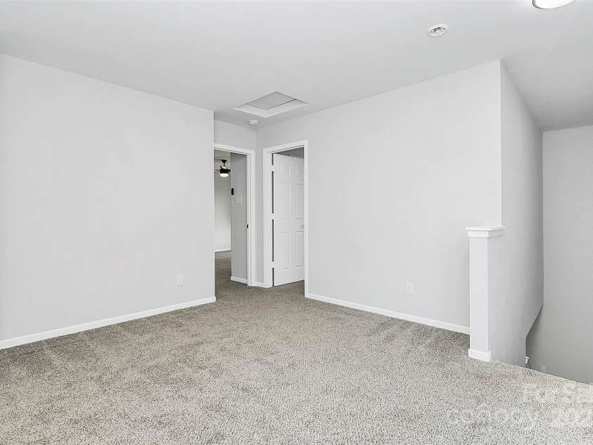 7214 Fox Point Drive, Charlotte, NC 28269.  MLS# CAR4266650, YatesRealty ID 17062. Landing at top of staircase