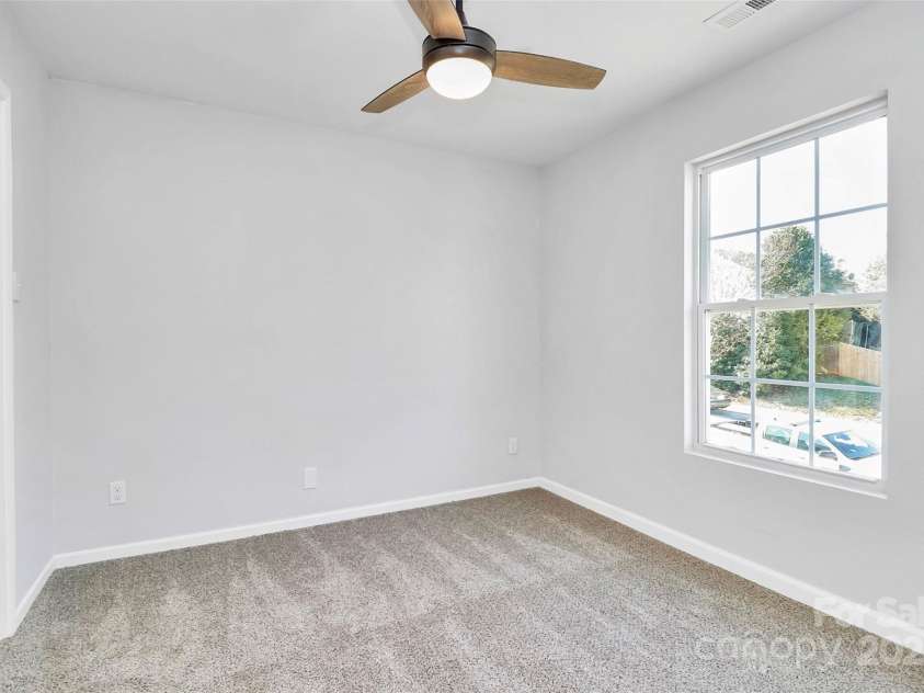 7214 Fox Point Drive, Charlotte, NC 28269.  MLS# CAR4266650, YatesRealty ID 17062. Secondary bedrooms with fans
