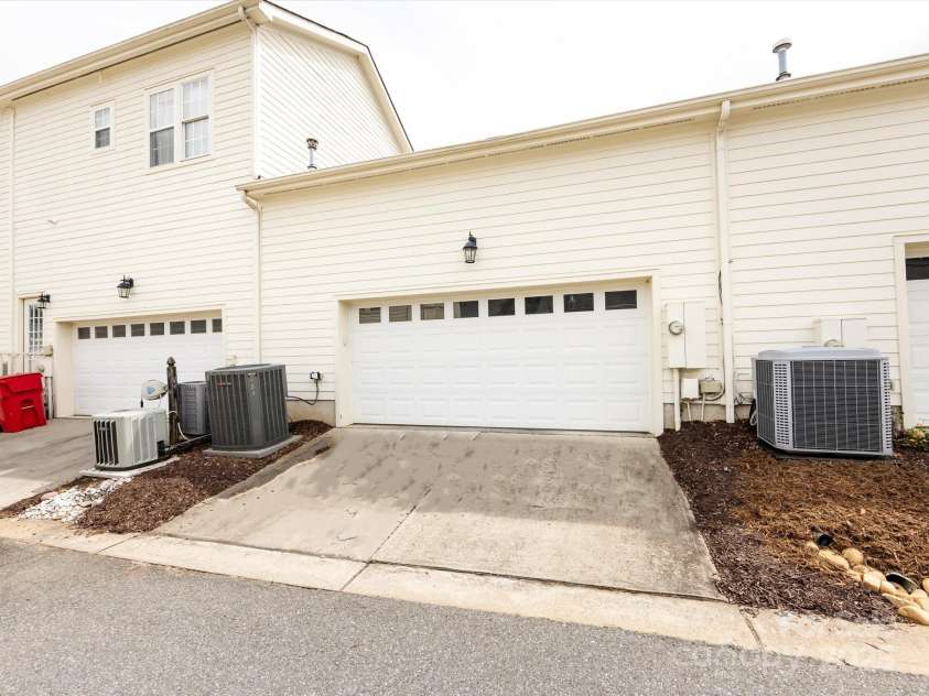 139 Harper Lee Street, Davidson, NC 28036.  MLS# CAR4262722, YatesRealty ID 17063. Rear alley entrance to the two-car garage
