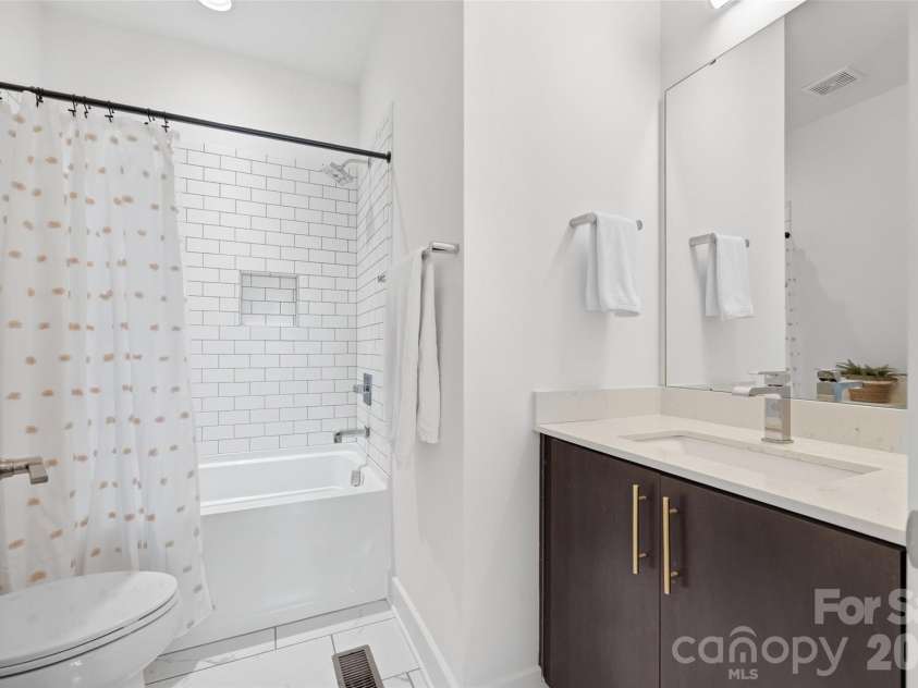 1633 Duckworth Avenue, Charlotte, NC 28208.  MLS# CAR4375706, YatesRealty ID 17071. Guest en-suite bath on third level