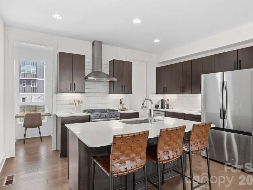 1633 Duckworth Avenue, Charlotte, NC 28208.  MLS# CAR4375706, YatesRealty ID 17071. Island kitchen with walk-in pantry