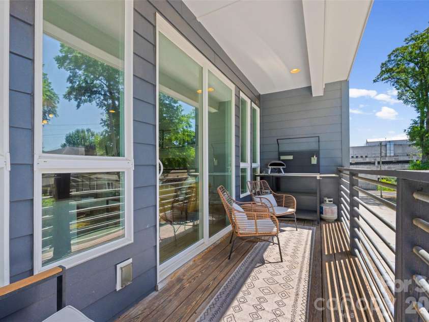 1633 Duckworth Avenue, Charlotte, NC 28208.  MLS# CAR4375706, YatesRealty ID 17071. Living level covered terrace