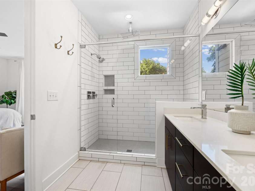 1633 Duckworth Avenue, Charlotte, NC 28208.  MLS# CAR4375706, YatesRealty ID 17071. Primary bathroom with dual shower heads