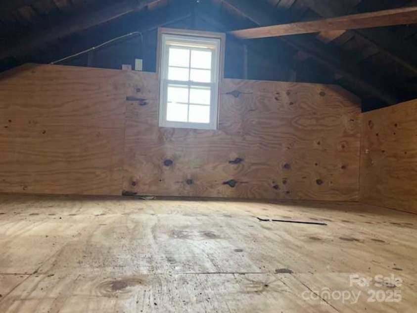 200 Hilltop Drive, Mooresboro, NC 28114.  MLS# CAR4265247, YatesRealty ID 17079. Attic area with pull down ladder