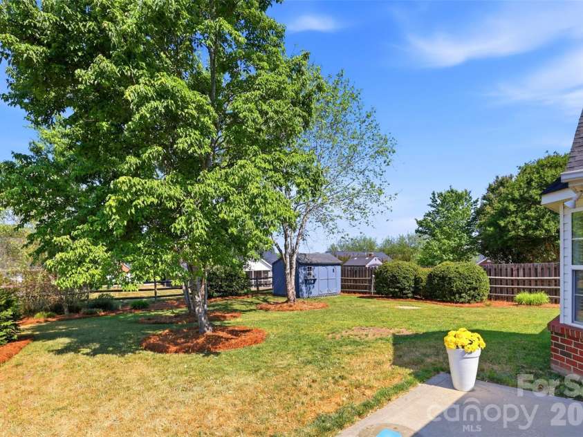 3371 Muddy Creek Road, Midland, NC 28107.  MLS# CAR4375674, YatesRealty ID 17080. Back Yard View