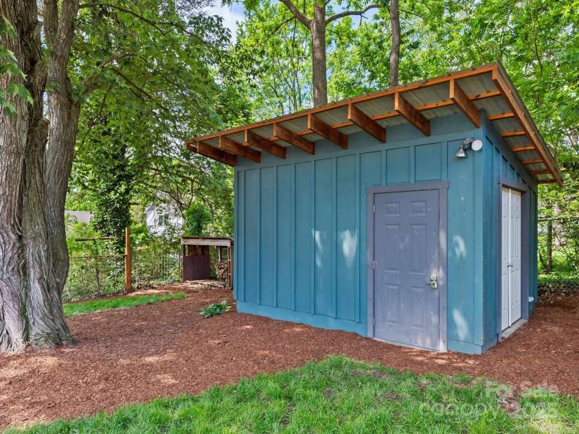 57 Nevada Avenue, Asheville, NC 28806.  MLS# CAR4255023, YatesRealty ID 17080. Studio/Shed