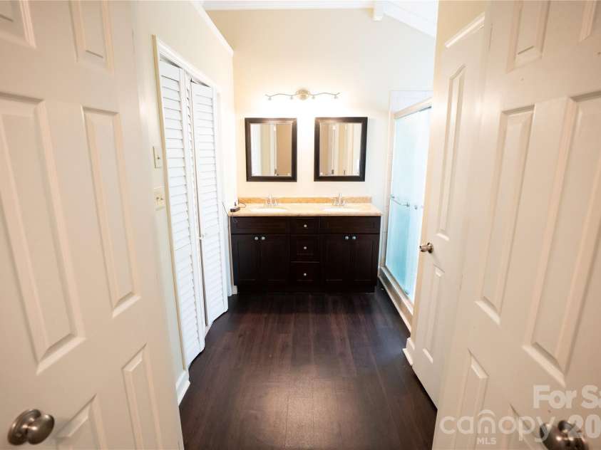 10737 Spruce Mountain Road, Charlotte, NC 28214.  MLS# CAR4368909, YatesRealty ID 17086. Primary bathroom