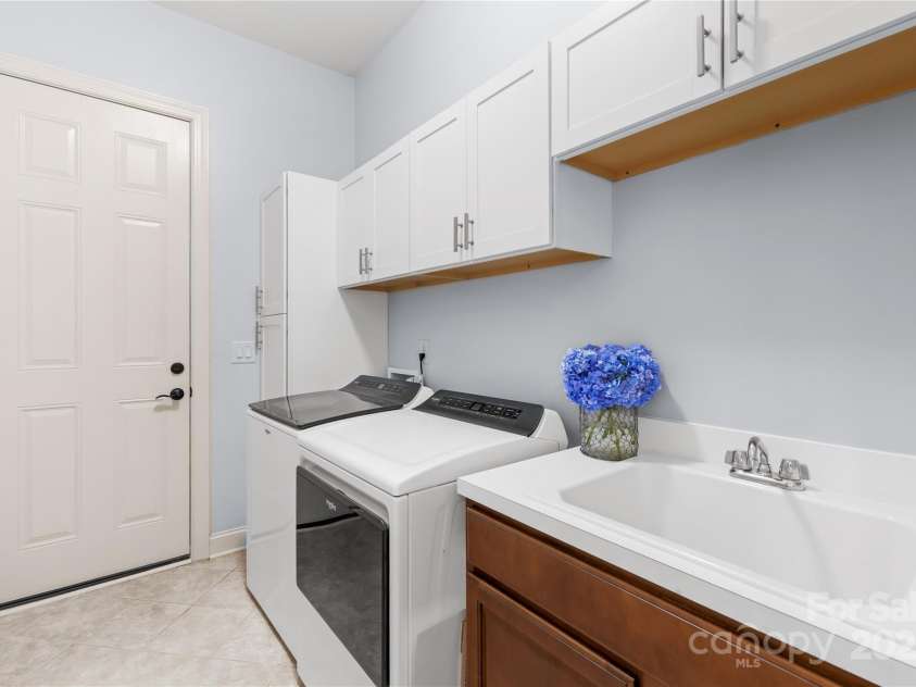 2289 Pine Valley Drive, Denver, NC 28037.  MLS# CAR4263333, YatesRealty ID 17088. Laundry with door to 3rd car garage area