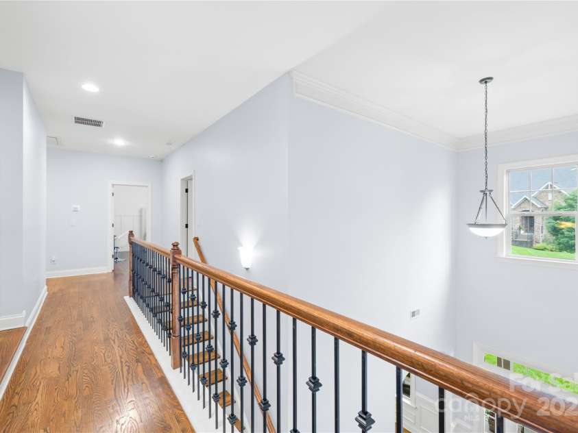 2289 Pine Valley Drive, Denver, NC 28037.  MLS# CAR4263333, YatesRealty ID 17088. Wide, Bright Upper level walk way landing.