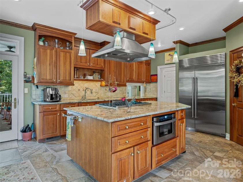 212 Plains Drive, Asheville, NC 28803.  MLS# CAR4373676, YatesRealty ID 17089. Creativity abounds in this well appointed kitchen